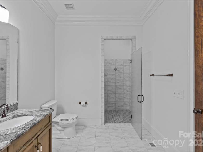 304 Ivy Springs Lane, Waxhaw, NC 28173.  MLS# CAR4239863, YatesRealty ID 5251. Guest suite bathroom/ handicap accessible