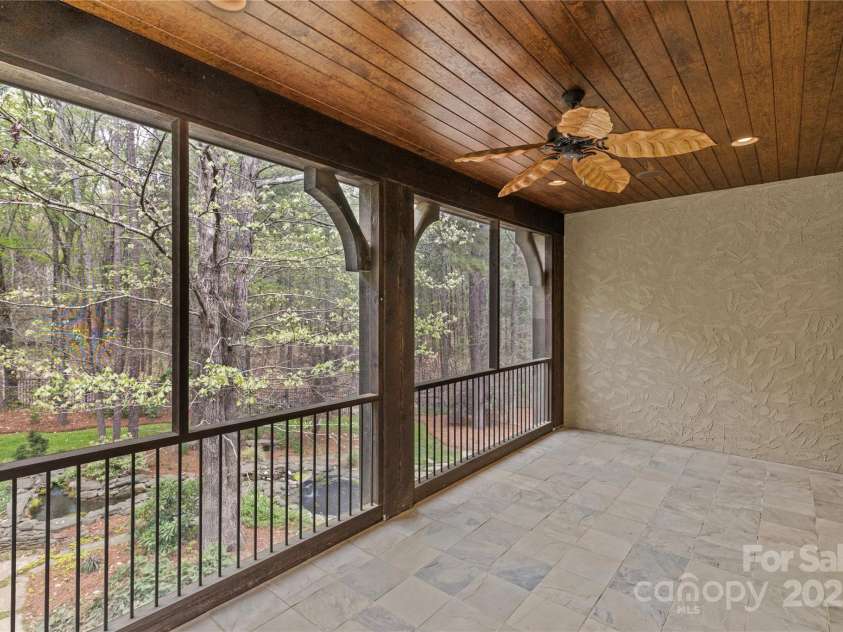 304 Ivy Springs Lane, Waxhaw, NC 28173.  MLS# CAR4239863, YatesRealty ID 5251. Screened in terrace off primary bedroom