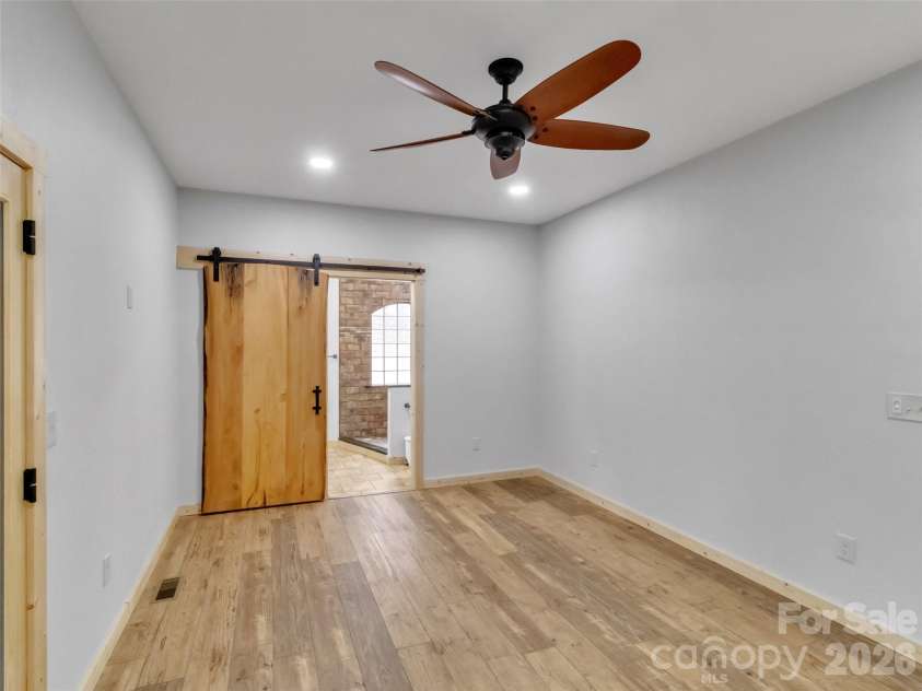 171 Cowtail Cove, Clyde, NC 28721.  MLS# CAR4341951, YatesRealty ID 5252. Master bedroom
