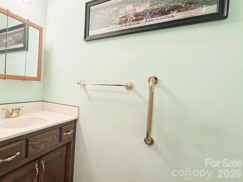 2008 Deep Woods Drive, Hendersonville, NC 28739.  MLS# CAR4424747, YatesRealty ID 52522. Powder room.