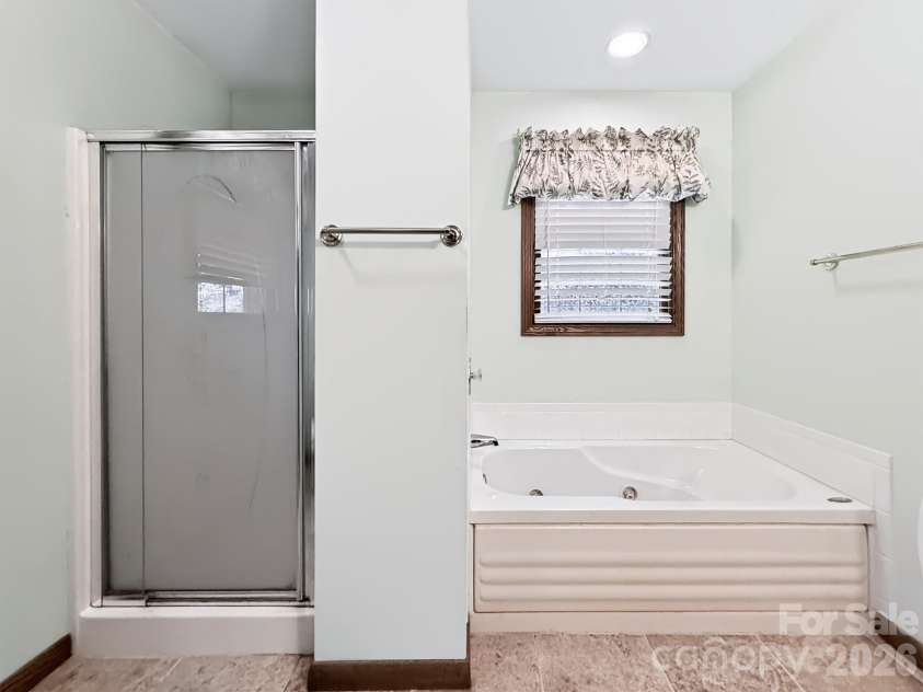 2008 Deep Woods Drive, Hendersonville, NC 28739.  MLS# CAR4424747, YatesRealty ID 52522. Primary bathroom.