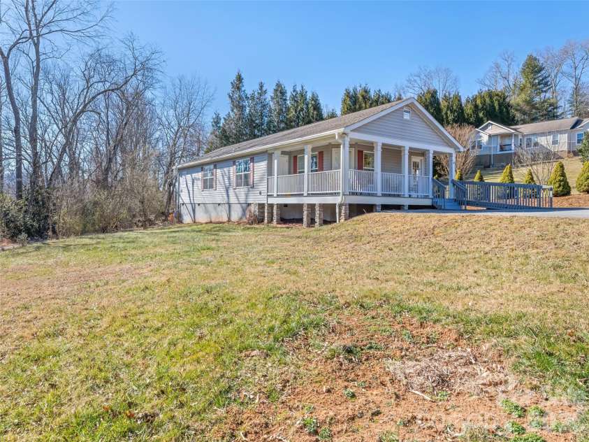 10 Enochs Way, Fletcher, NC 28732.  MLS# CAR4333141, YatesRealty ID 5253. Open Side Yard to Home