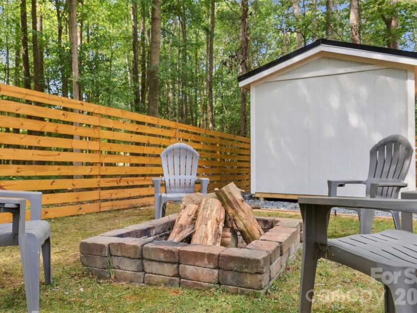 3000 Faircroft Way, Monroe, NC 28110.  MLS# CAR4427543, YatesRealty ID 52533. Bonfire anyone?