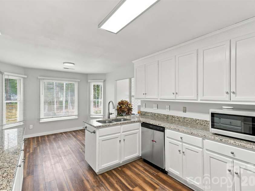 3000 Faircroft Way, Monroe, NC 28110.  MLS# CAR4427543, YatesRealty ID 52533. Kitchen- updated cabinets & updated granite