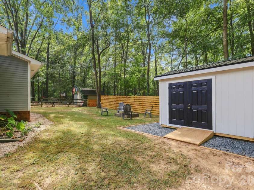 3000 Faircroft Way, Monroe, NC 28110.  MLS# CAR4427543, YatesRealty ID 52533. Level, useable backyard surrounded by a wooden privacy fence