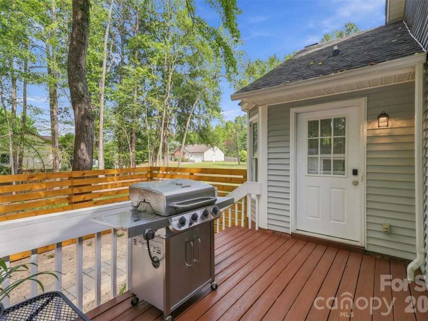 3000 Faircroft Way, Monroe, NC 28110.  MLS# CAR4427543, YatesRealty ID 52533. Well maintained rear deck