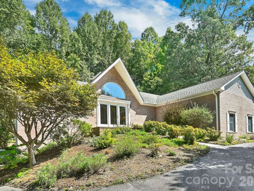 4311 Cove Loop Road, Hendersonville, NC 28739.  MLS# CAR4427450, YatesRealty ID 52539. 