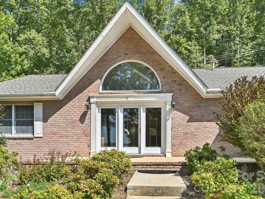4311 Cove Loop Road, Hendersonville, NC 28739.  MLS# CAR4427450, YatesRealty ID 52539. 