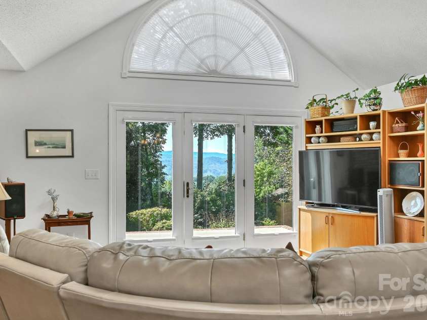 4311 Cove Loop Road, Hendersonville, NC 28739.  MLS# CAR4427450, YatesRealty ID 52539. 