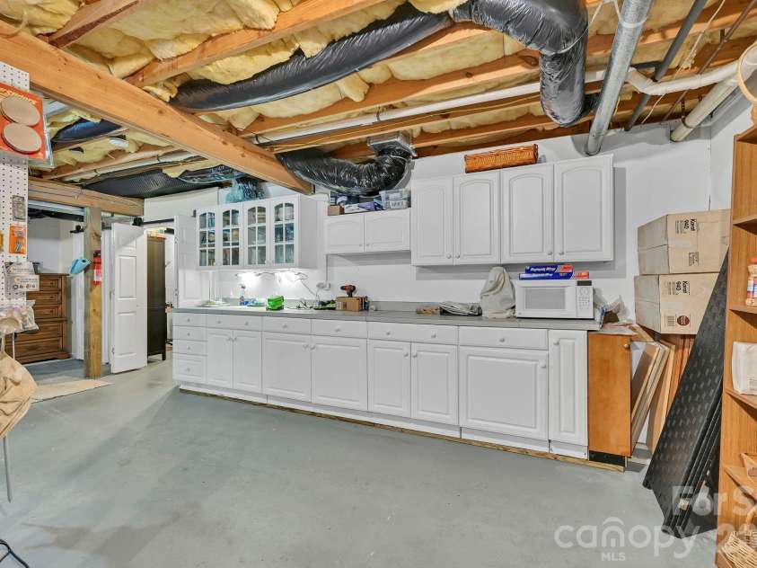 4311 Cove Loop Road, Hendersonville, NC 28739.  MLS# CAR4427450, YatesRealty ID 52539. 