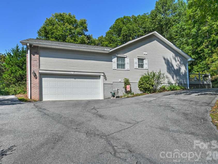 4311 Cove Loop Road, Hendersonville, NC 28739.  MLS# CAR4427450, YatesRealty ID 52539. 
