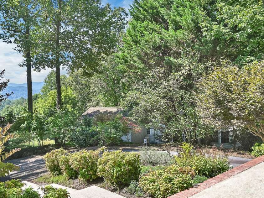 4311 Cove Loop Road, Hendersonville, NC 28739.  MLS# CAR4427450, YatesRealty ID 52539. 