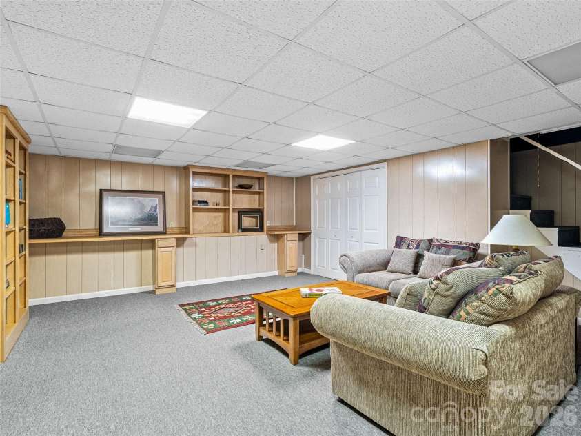 3802 Timber Trail, Asheville, NC 28804.  MLS# CAR4331824, YatesRealty ID 5254. Lower Level Den / Bonus Room with direct access to Garage