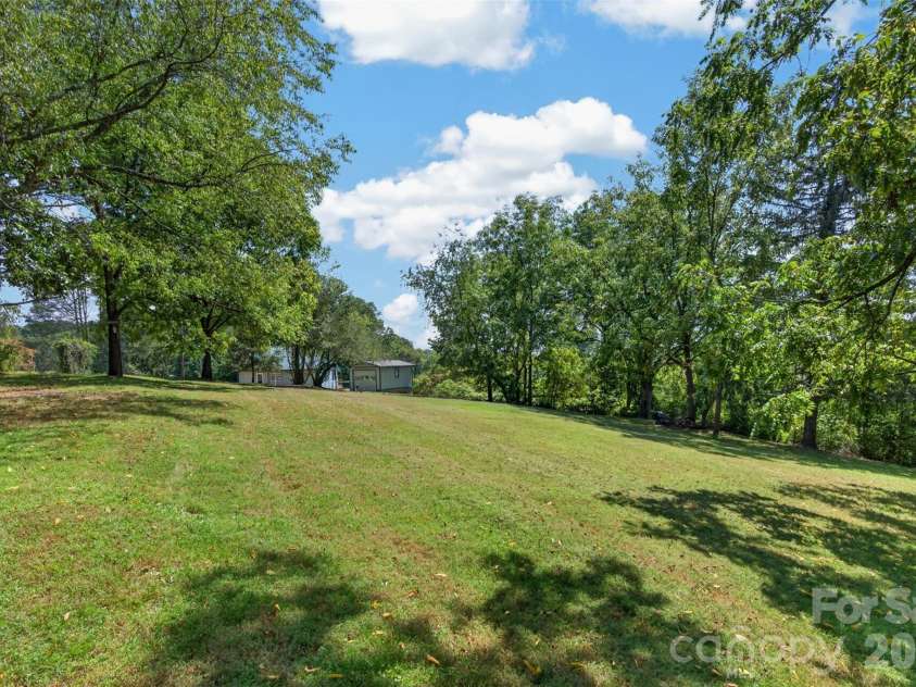 266 Starnes Cove Road, Candler, NC 28715.  MLS# CAR4425562, YatesRealty ID 52542. 