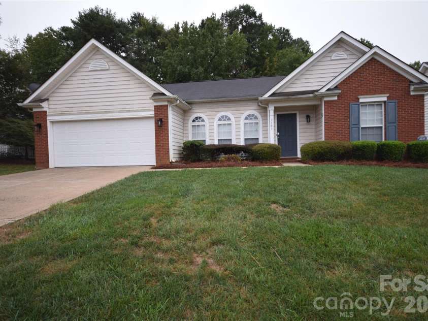 3703 Sipes Lane, Charlotte, NC 28269.  MLS# CAR4427150, YatesRealty ID 52548. Front elevation with brick accents
