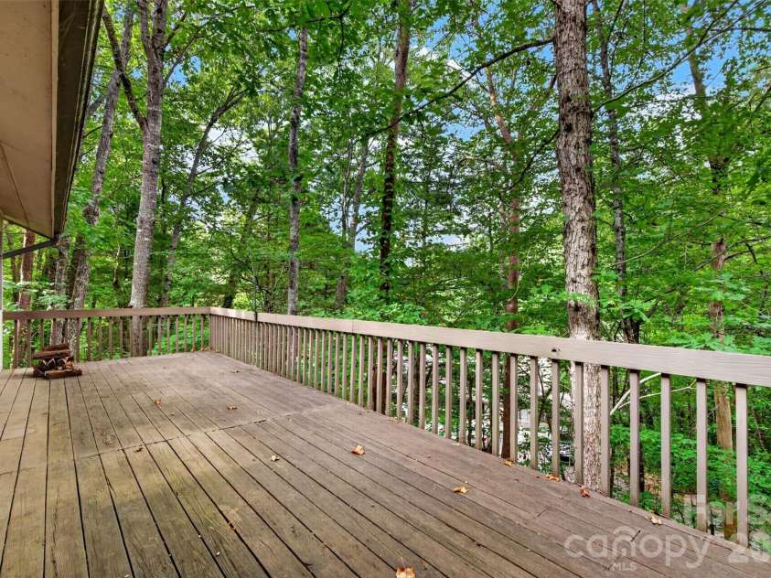 18 Cedarwood Trail, Asheville, NC 28803.  MLS# CAR4427783, YatesRealty ID 52549. Large deck overlooking nature