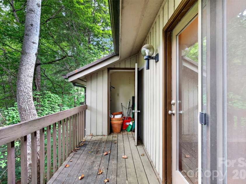 18 Cedarwood Trail, Asheville, NC 28803.  MLS# CAR4427783, YatesRealty ID 52549. Large deck with storage