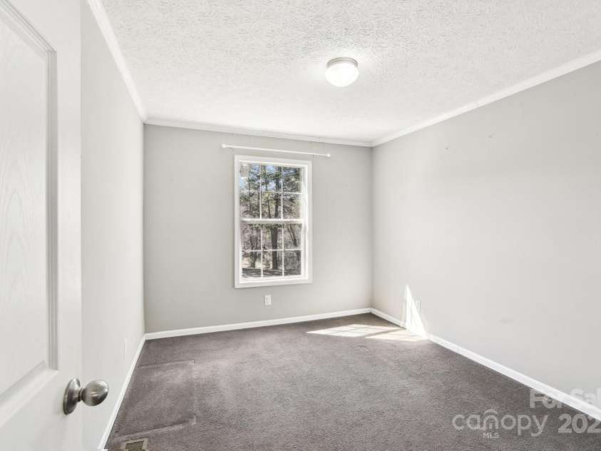 296 Sentelle Lane, Hendersonville, NC 28739.  MLS# CAR4226674, YatesRealty ID 5255. Bedroom 2