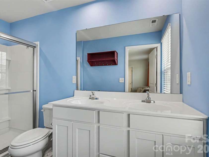 4112 Bowline Drive, Charlotte, NC 28269.  MLS# CAR4426572, YatesRealty ID 52559. Primary bathroom