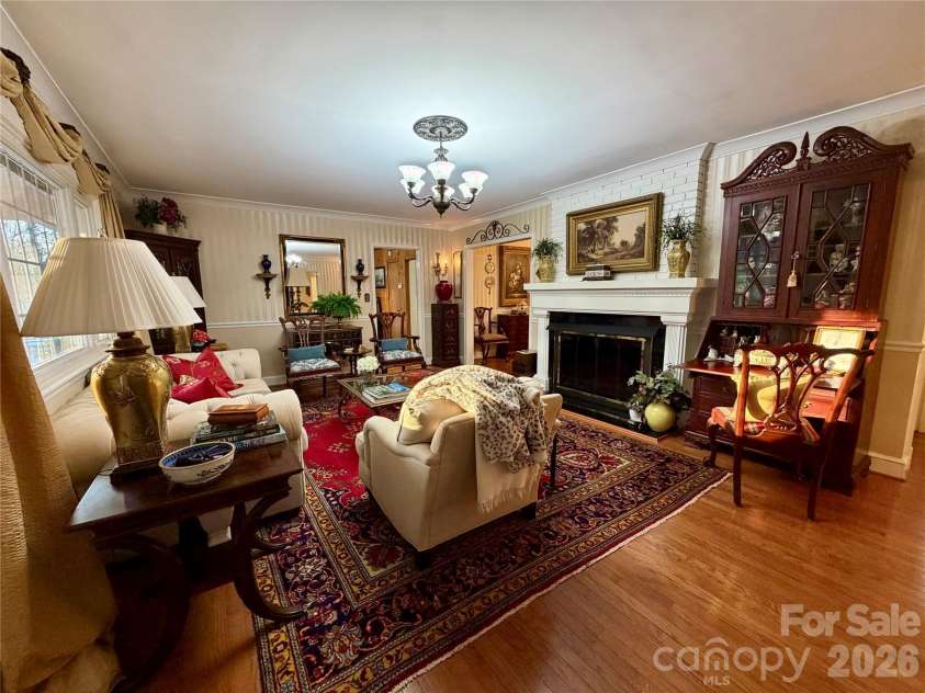 920 Paramount Circle, Gastonia, NC 28052.  MLS# CAR4354209, YatesRealty ID 5257. Formal living area with a fire place.