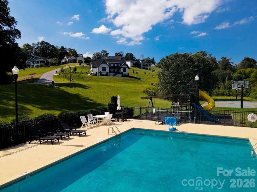 153 Israel Road, Leicester, NC 28748.  MLS# CAR4427403, YatesRealty ID 52573. Community Pool