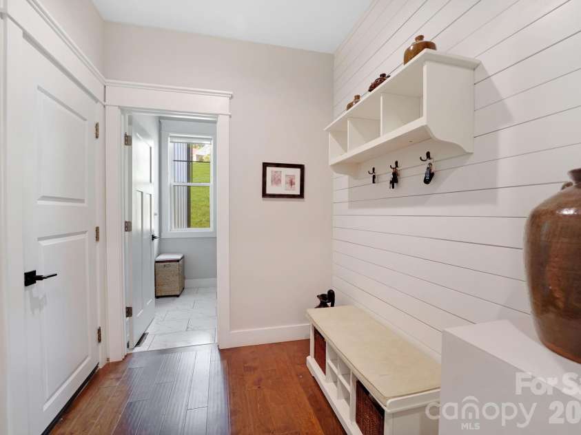 153 Israel Road, Leicester, NC 28748.  MLS# CAR4427403, YatesRealty ID 52573. Looking to Laundry Room