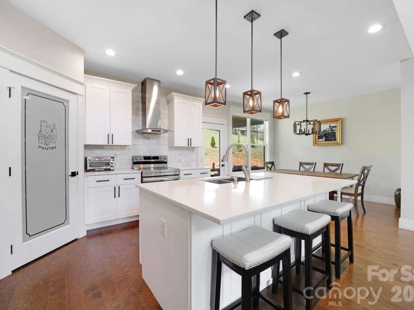 153 Israel Road, Leicester, NC 28748.  MLS# CAR4427403, YatesRealty ID 52573. Well Equipped Kitchen