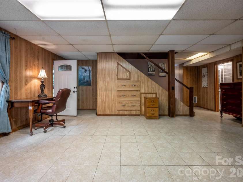 101 Guffey Mountain Road, Fairview, NC 28730.  MLS# CAR4426718, YatesRealty ID 52584. Access from outside to lower level