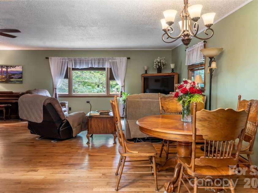 101 Guffey Mountain Road, Fairview, NC 28730.  MLS# CAR4426718, YatesRealty ID 52584. Main dining/living area