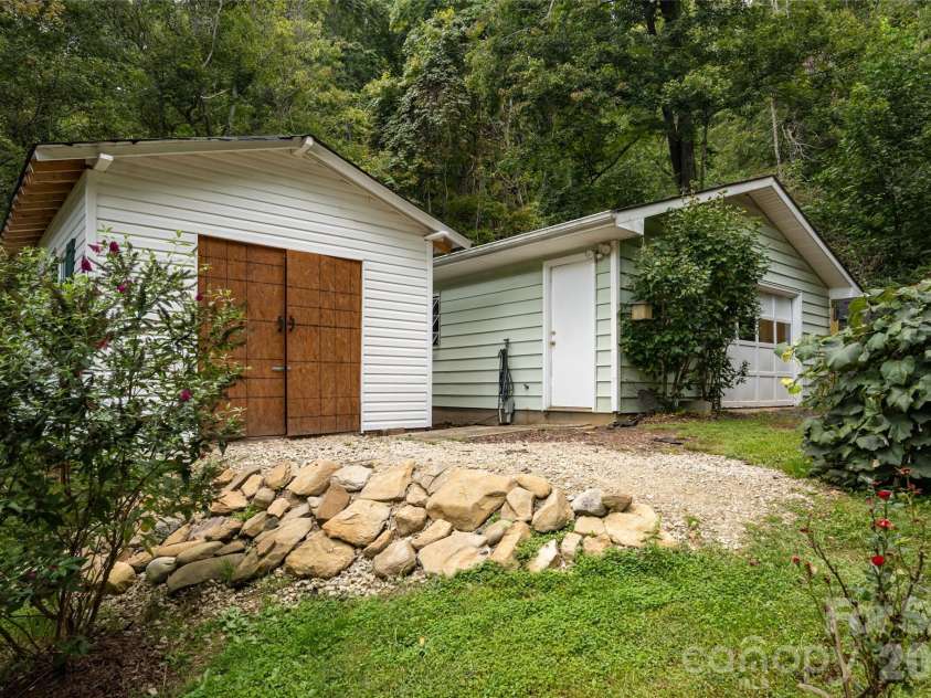 101 Guffey Mountain Road, Fairview, NC 28730.  MLS# CAR4426718, YatesRealty ID 52584. New storage building and the garage