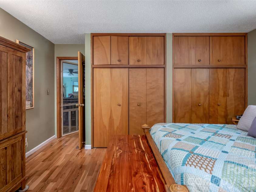 101 Guffey Mountain Road, Fairview, NC 28730.  MLS# CAR4426718, YatesRealty ID 52584. Primary bedroom closets