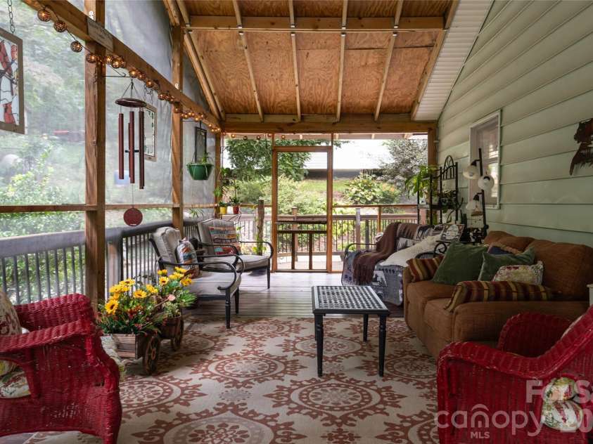 101 Guffey Mountain Road, Fairview, NC 28730.  MLS# CAR4426718, YatesRealty ID 52584. Screened in porch