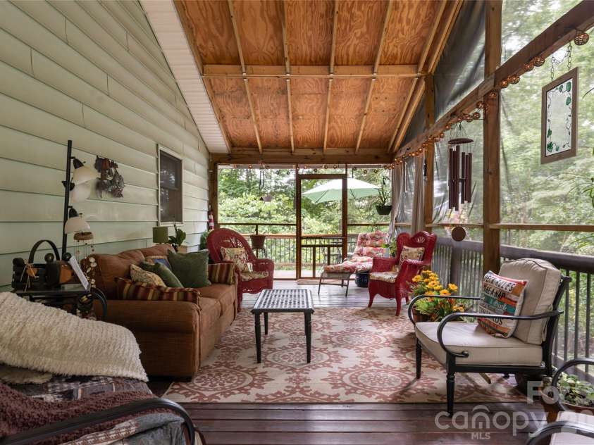 101 Guffey Mountain Road, Fairview, NC 28730.  MLS# CAR4426718, YatesRealty ID 52584. Screened in side deck