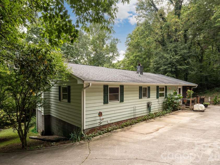 101 Guffey Mountain Road, Fairview, NC 28730.  MLS# CAR4426718, YatesRealty ID 52584. Upper driveway- main entrance