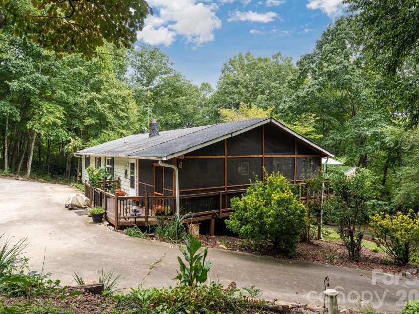 101 Guffey Mountain Road, Fairview, NC 28730.  MLS# CAR4426718, YatesRealty ID 52584. Upper driveway - main entrance