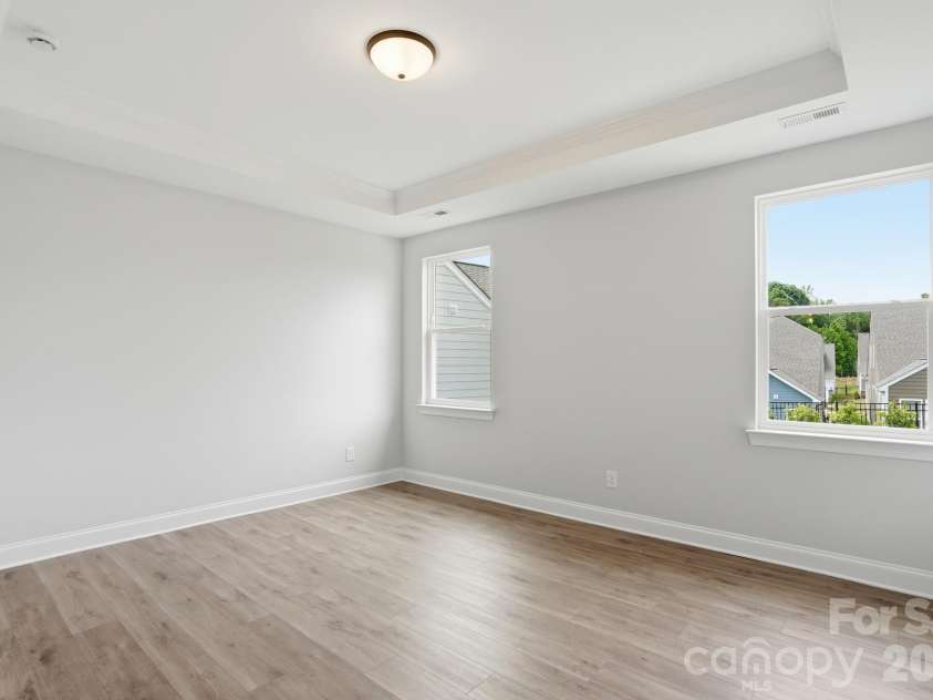 122 Dunlavin Way, Mooresville, NC 28115.  MLS# CAR4339879, YatesRealty ID 52588. Primary Bedroom