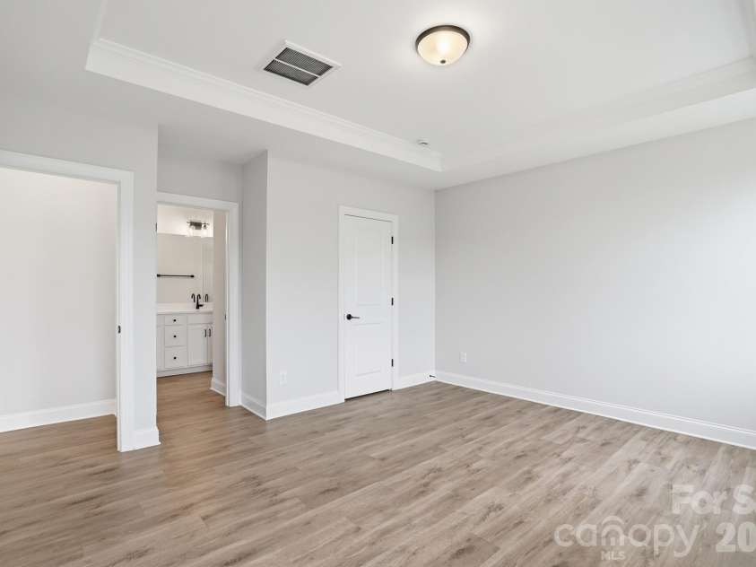 122 Dunlavin Way, Mooresville, NC 28115.  MLS# CAR4339879, YatesRealty ID 52588. Primary Bedroom
