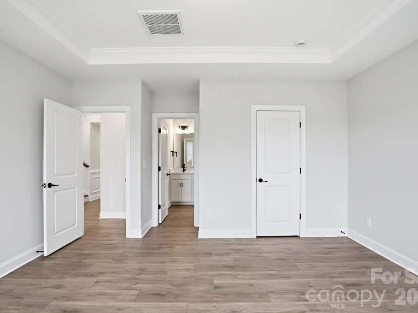 122 Dunlavin Way, Mooresville, NC 28115.  MLS# CAR4339879, YatesRealty ID 52588. Primary Bedroom