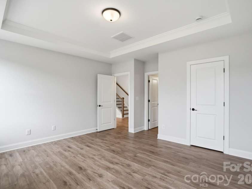 122 Dunlavin Way, Mooresville, NC 28115.  MLS# CAR4339879, YatesRealty ID 52588. Primary Bedroom