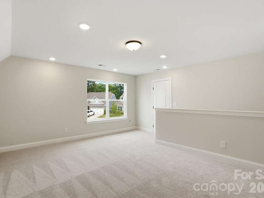 122 Dunlavin Way, Mooresville, NC 28115.  MLS# CAR4339879, YatesRealty ID 52588. Upstairs Loft
