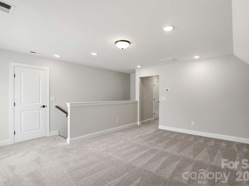 122 Dunlavin Way, Mooresville, NC 28115.  MLS# CAR4339879, YatesRealty ID 52588. Upstairs Loft
