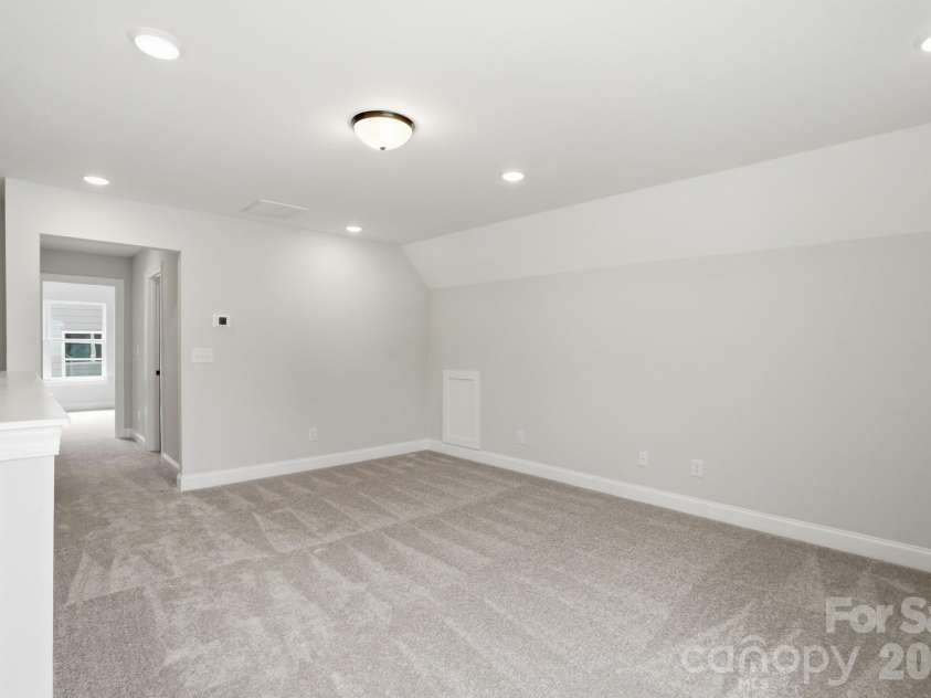 122 Dunlavin Way, Mooresville, NC 28115.  MLS# CAR4339879, YatesRealty ID 52588. Upstairs Loft