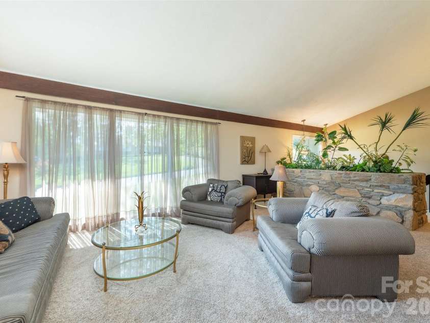 127 College Circle, Swannanoa, NC 28778.  MLS# CAR4427251, YatesRealty ID 52594. Living room seating area - mountain views