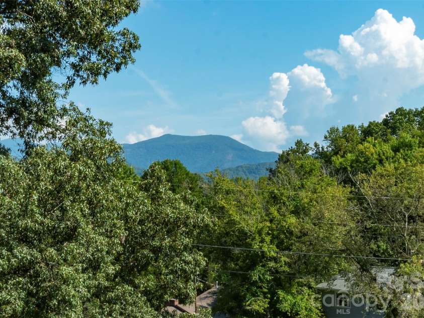 127 College Circle, Swannanoa, NC 28778.  MLS# CAR4427251, YatesRealty ID 52594. Panoramic Blue Ridge Mountain view from deck