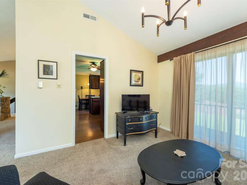 127 College Circle, Swannanoa, NC 28778.  MLS# CAR4427251, YatesRealty ID 52594. Sliding door access to deck - views