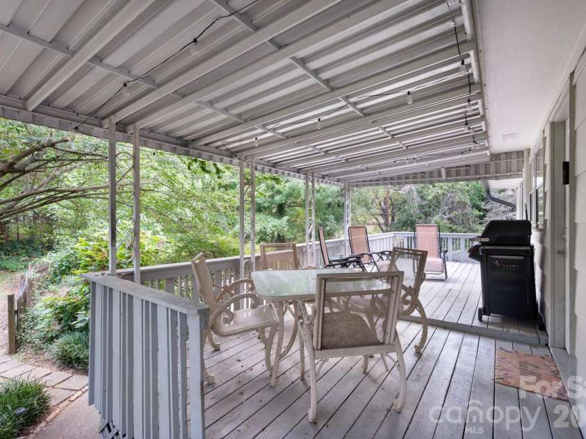 109 Wilshire Drive, Asheville, NC 28806.  MLS# CAR4421806, YatesRealty ID 52602. Large partially covered deck for dining, lounging and entertaining