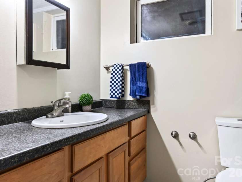 109 Wilshire Drive, Asheville, NC 28806.  MLS# CAR4421806, YatesRealty ID 52602. Second full bathroom on the lower level