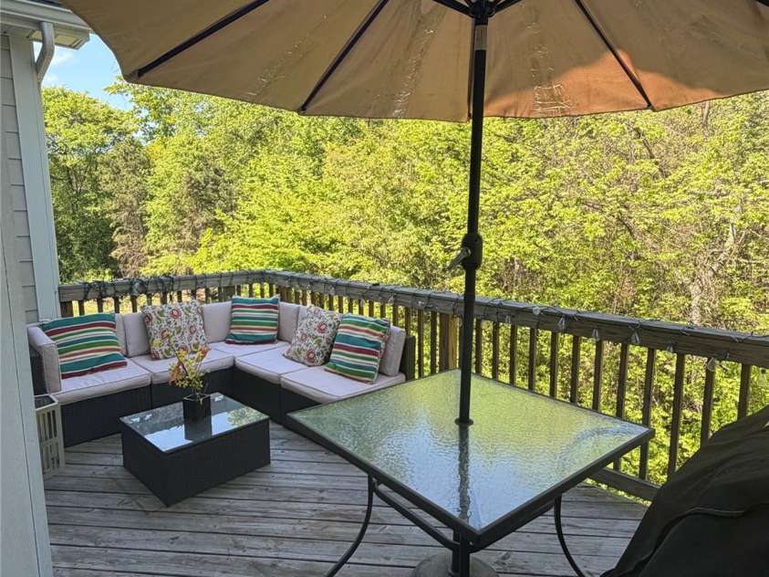 3046 Woodlands Creek Drive, Monroe, NC 28110.  MLS# CAR4366834, YatesRealty ID 52603. Deck overlooking backyard