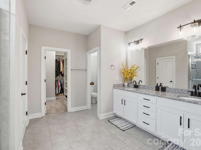 3046 Woodlands Creek Drive, Monroe, NC 28110.  MLS# CAR4366834, YatesRealty ID 52603. Primary Bathrm 1