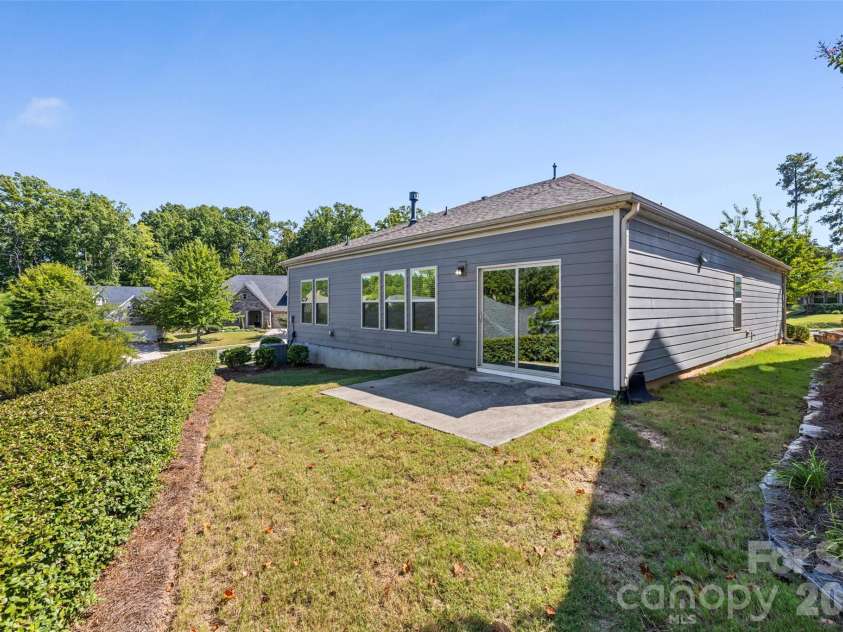14830 Batteliere Drive, Charlotte, NC 28278.  MLS# CAR4424423, YatesRealty ID 52604. Oversized lot with treeline for privacy.